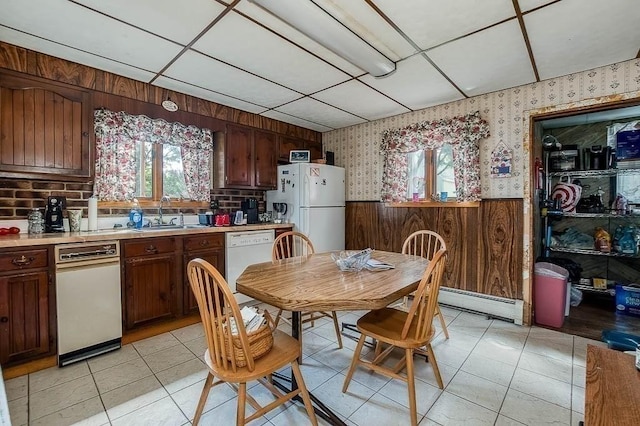 26 Hawthorne St, Brockton, MA 02301 - kitchen featuring white appliances, wallpapered walls, wainscoting, healthy amount of natural light, and light countertops