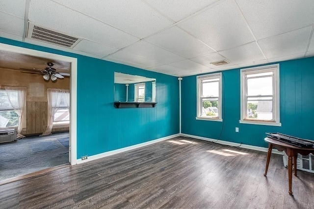 26 Hawthorne St, Brockton, MA 02301 - unfurnished room featuring a drop ceiling, wood finished floors, baseboards, and a ceiling fan