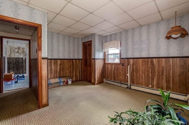 26 Hawthorne St, Brockton, MA 02301 - spare room with a wainscoted wall, wallpapered walls, a paneled ceiling, baseboard heating, and carpet flooring