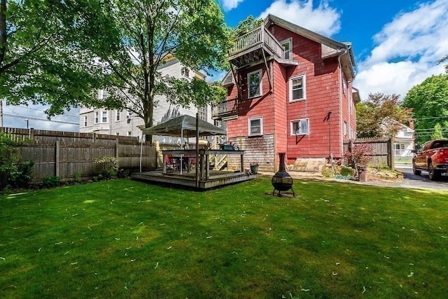 26 Hawthorne St, Brockton, MA 02301 - rear view of house featuring a gazebo and a wooden deck