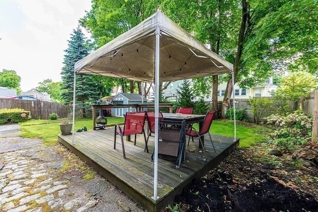 26 Hawthorne St, Brockton, MA 02301 - wooden deck featuring outdoor dining area and a gazebo