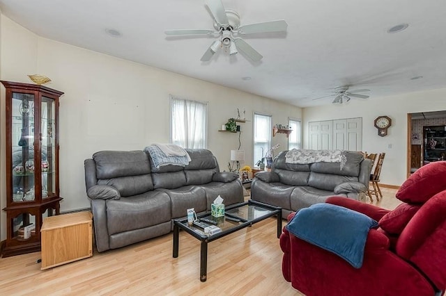 26 Hawthorne St, Brockton, MA 02301 - living room with a ceiling fan and light wood-style flooring