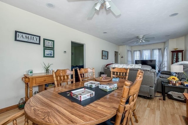 26 Hawthorne St, Brockton, MA 02301 - dining area with a ceiling fan, light wood finished floors, and baseboards