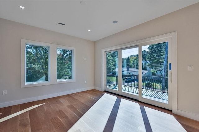 doorway with light hardwood / wood-style flooring