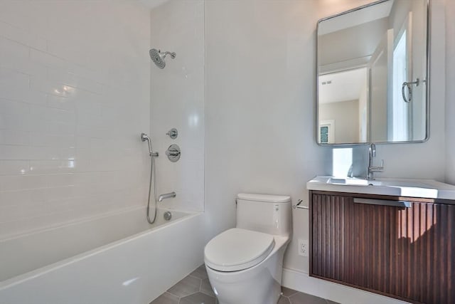 full bathroom featuring shower / bathing tub combination, vanity, tile patterned flooring, and toilet