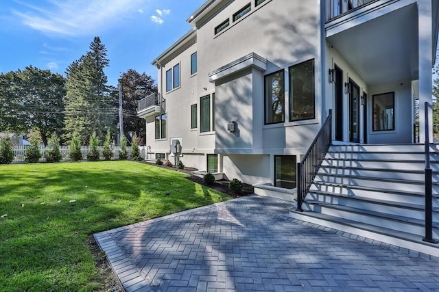 exterior space with a yard and a patio area