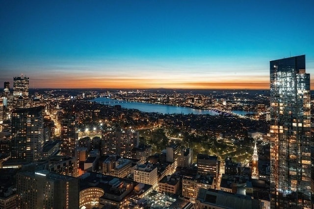 property's view of city featuring a water view