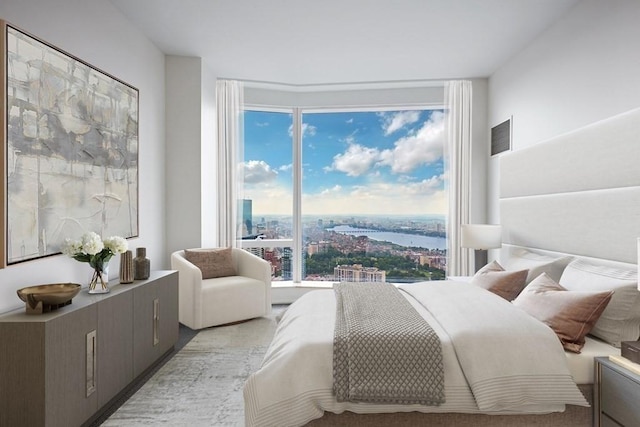 carpeted bedroom with a water view