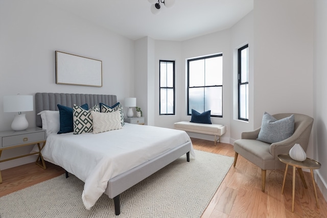 bedroom with light hardwood / wood-style flooring