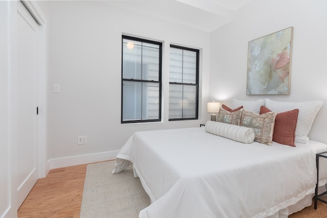 bedroom featuring light wood-type flooring