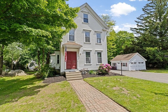 225 Pleasant St, Weymouth, MA 02190 - view of front of property with an outdoor structure and a front yard