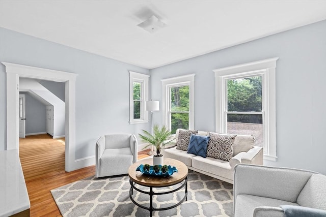 225 Pleasant St, Weymouth, MA 02190 - living area featuring wood finished floors and baseboards