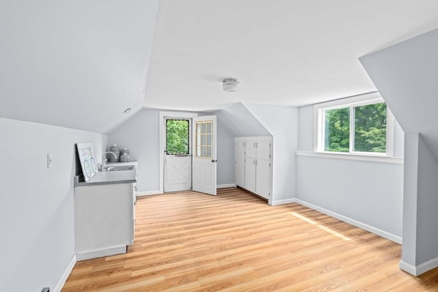 225 Pleasant St, Weymouth, MA 02190 - bonus room with vaulted ceiling, light wood-style floors, baseboards, and a sink