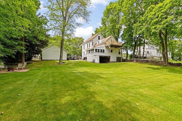 225 Pleasant St, Weymouth, MA 02190 - view of grassy yard with a fire pit and a balcony