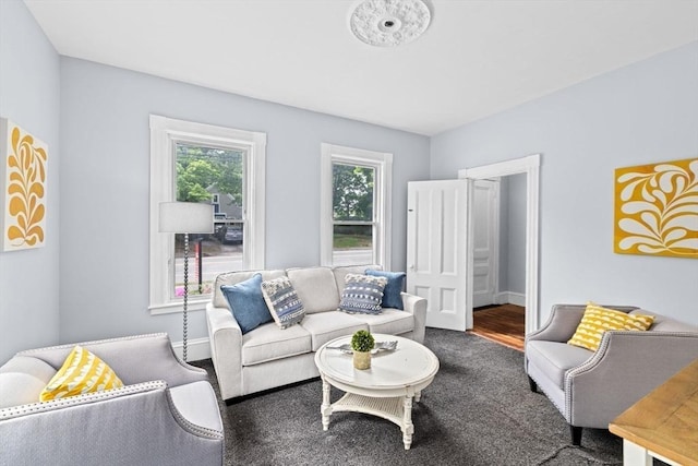 225 Pleasant St, Weymouth, MA 02190 - living area featuring baseboards and wood finished floors
