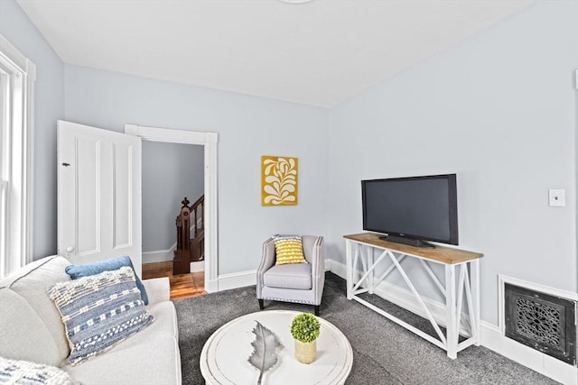 225 Pleasant St, Weymouth, MA 02190 - living area featuring baseboards