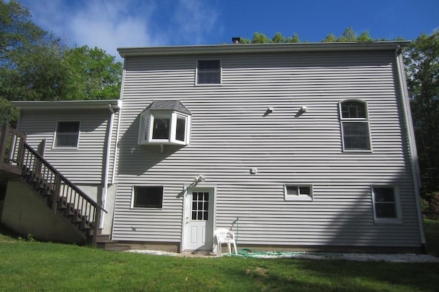 30 Bailey Rd, Oxford, MA 01540 - back of property featuring stairway and a yard