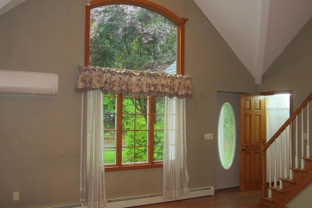 30 Bailey Rd, Oxford, MA 01540 - entryway with a wall mounted AC, wood finished floors, stairway, plenty of natural light, and lofted ceiling