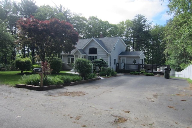 30 Bailey Rd, Oxford, MA 01540 - view of front facade with asphalt driveway, a wooden deck, and a chimney