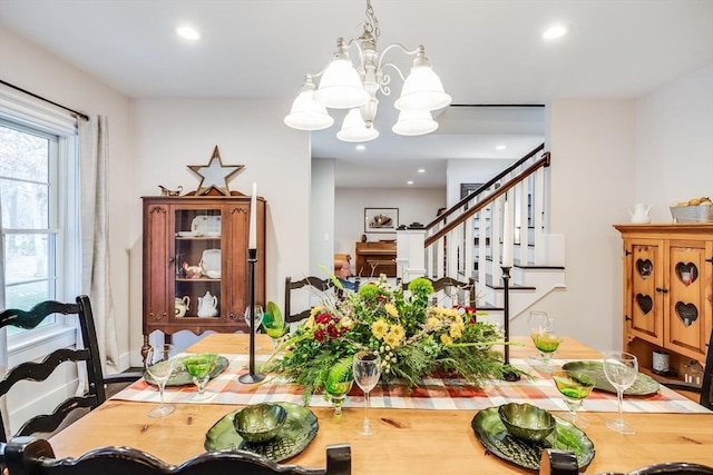 dining space featuring a notable chandelier