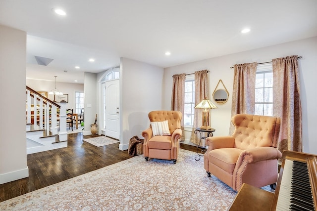 living area with dark hardwood / wood-style flooring