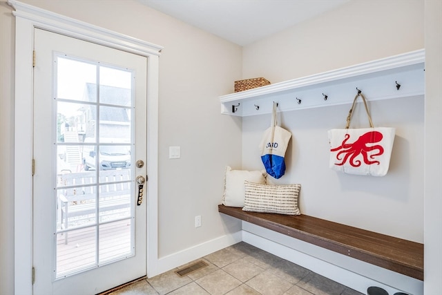 mudroom featuring light tile patterned floors