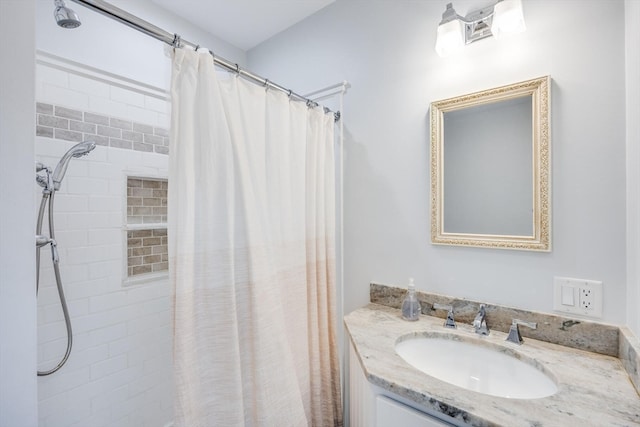 bathroom with a shower with curtain and vanity