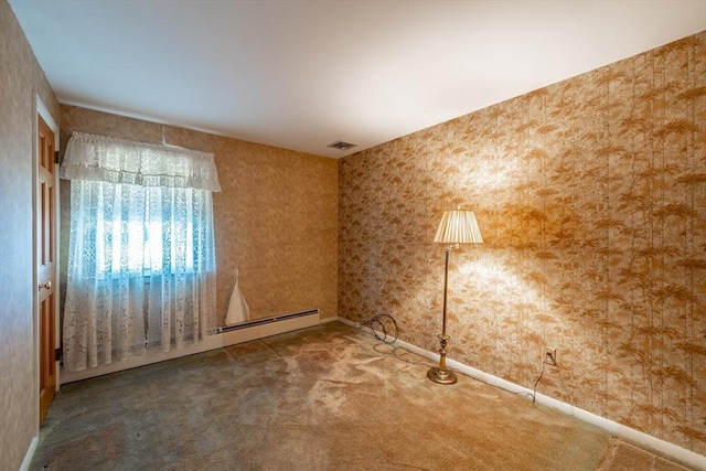 empty room with visible vents and carpet floors