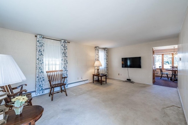 living area with a baseboard radiator and carpet