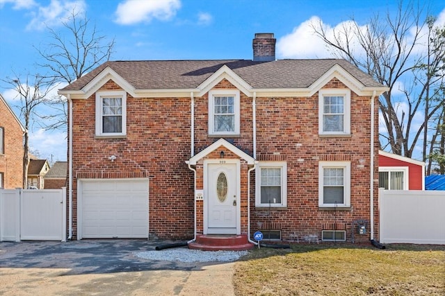 view of front facade featuring brick siding and fence