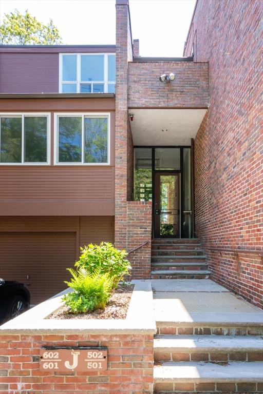 241 Perkins St Unit J602, Boston, MA 02130 - entrance to property featuring brick siding