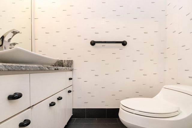 241 Perkins St Unit J602, Boston, MA 02130 - bathroom with vanity, toilet, and tile patterned flooring