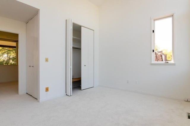 241 Perkins St Unit J602, Boston, MA 02130 - unfurnished bedroom featuring carpet floors and a closet