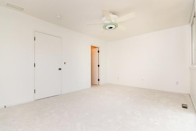 241 Perkins St Unit J602, Boston, MA 02130 - unfurnished bedroom featuring light colored carpet, a ceiling fan, and a closet
