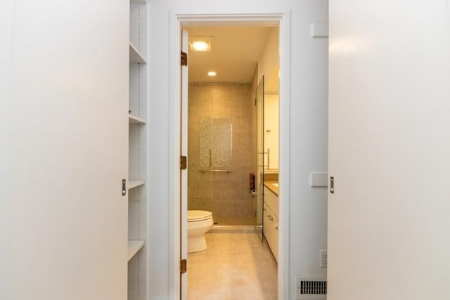 241 Perkins St Unit J602, Boston, MA 02130 - full bathroom featuring toilet, a shower stall, tile patterned flooring, and vanity