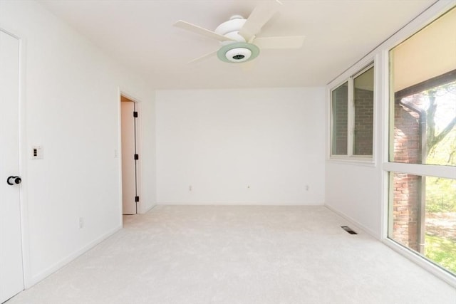 241 Perkins St Unit J602, Boston, MA 02130 - empty room with light colored carpet, a ceiling fan, and baseboards