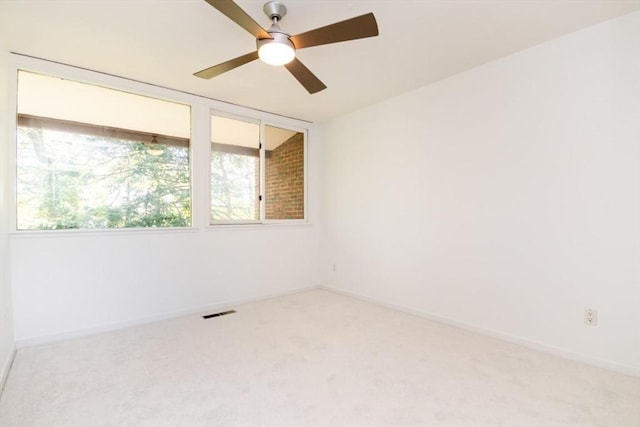 241 Perkins St Unit J602, Boston, MA 02130 - carpeted spare room with ceiling fan and baseboards
