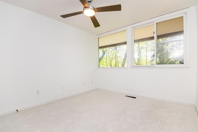 241 Perkins St Unit J602, Boston, MA 02130 - empty room featuring carpet floors, ceiling fan, and baseboards