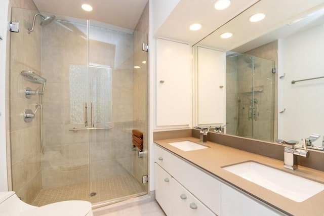 241 Perkins St Unit J602, Boston, MA 02130 - bathroom featuring recessed lighting, a shower stall, toilet, and double vanity