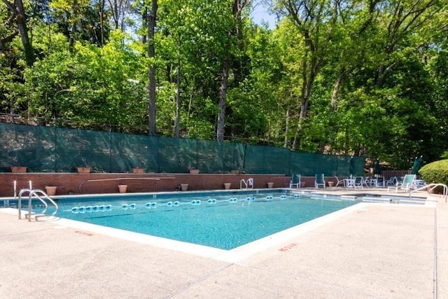 241 Perkins St Unit J602, Boston, MA 02130 - community pool with a patio area and fence