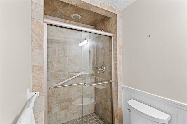 225 Lincoln St Unit G3, Duxbury, MA 02332 - full bathroom featuring wainscoting and a shower stall