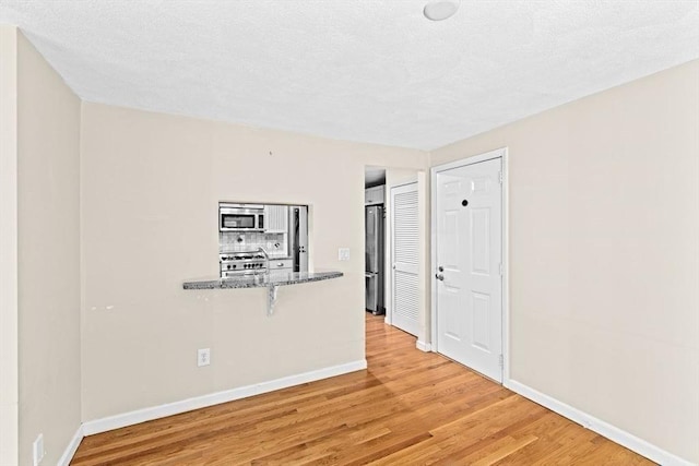 225 Lincoln St Unit G3, Duxbury, MA 02332 - spare room with light wood-type flooring