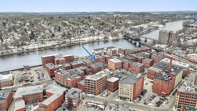 aerial view featuring a view of city and a water view