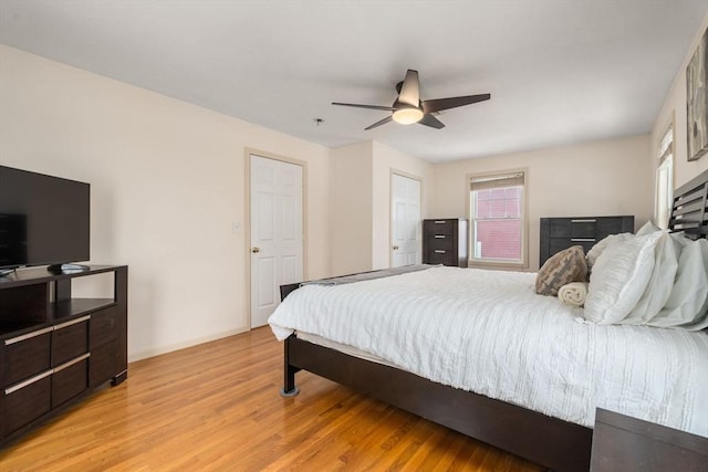 bedroom featuring ceiling fan and light wood-type flooring