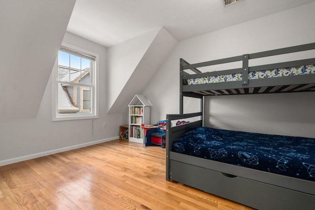 bedroom with light hardwood / wood-style floors