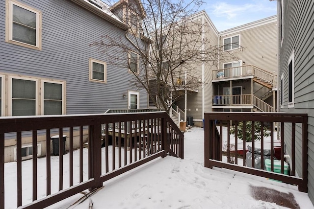 view of snow covered deck