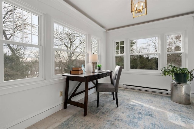 sunroom featuring an inviting chandelier and baseboard heating