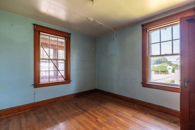 empty room featuring hardwood / wood-style flooring