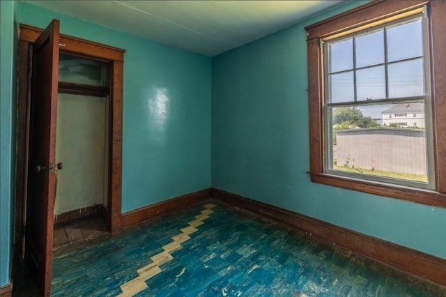 unfurnished bedroom featuring a closet