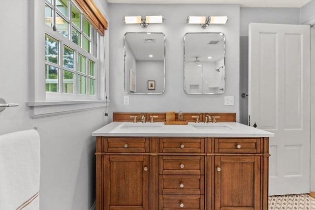114 Chestnut St, North Reading, MA 01864 - bathroom with double vanity and a shower